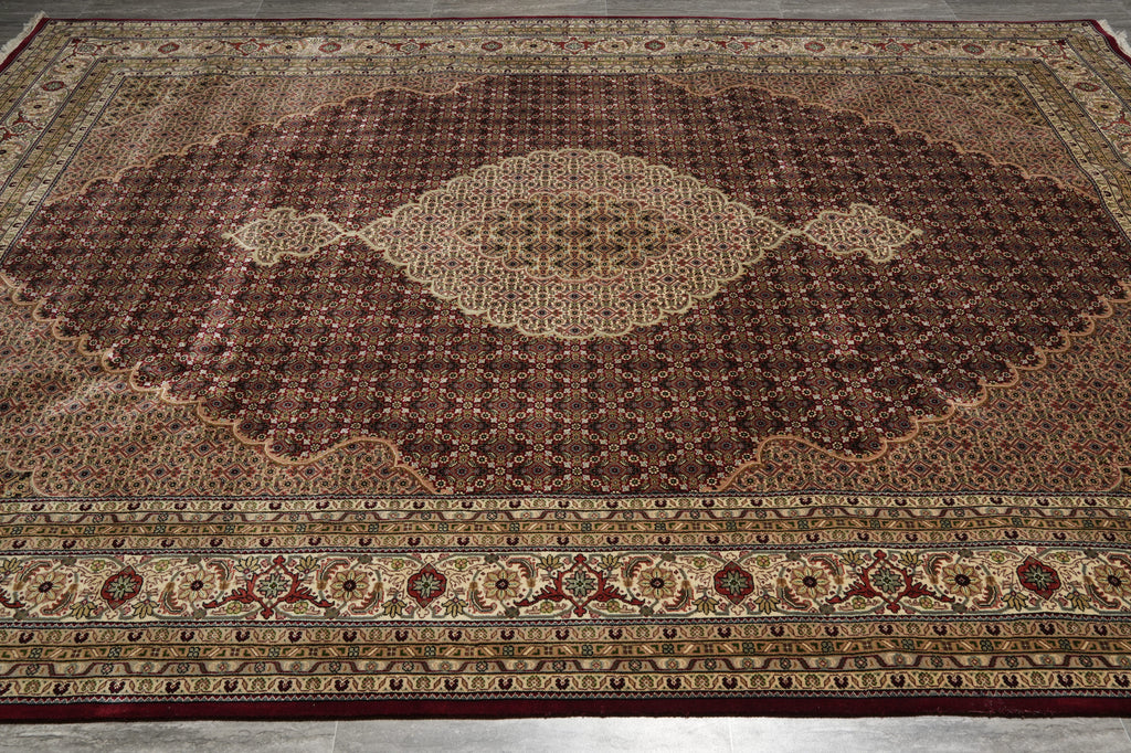 Decorative rug with intricate patterns on a plain background