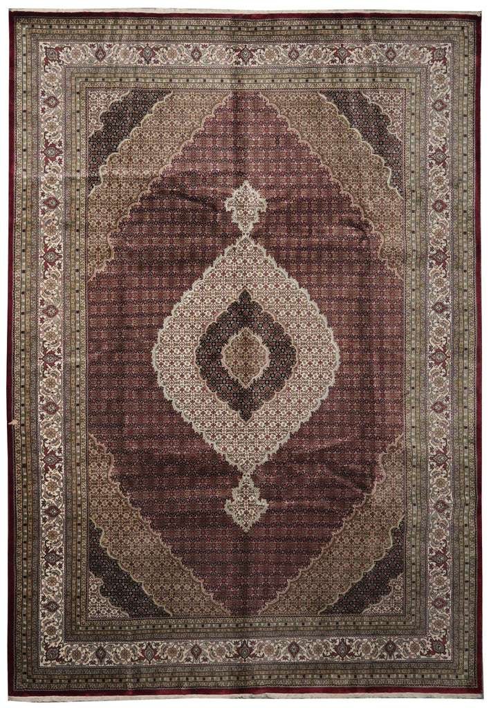 Decorative rug with intricate patterns and a central medallion design.