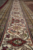 Load image into Gallery viewer, Close-up of an intricately patterned rug with detailed designs.