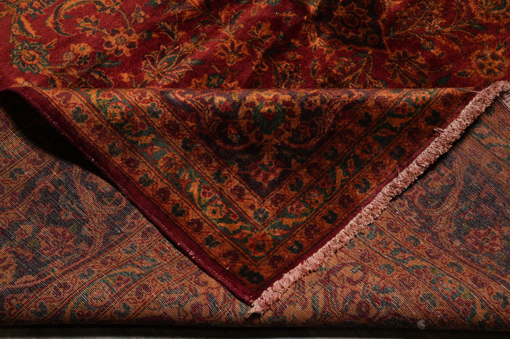 Close-up of a patterned rug with intricate designs.