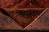 Load image into Gallery viewer, Close-up of a patterned rug with intricate designs.