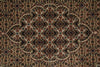 Load image into Gallery viewer, Close-up of a patterned rug with intricate designs.