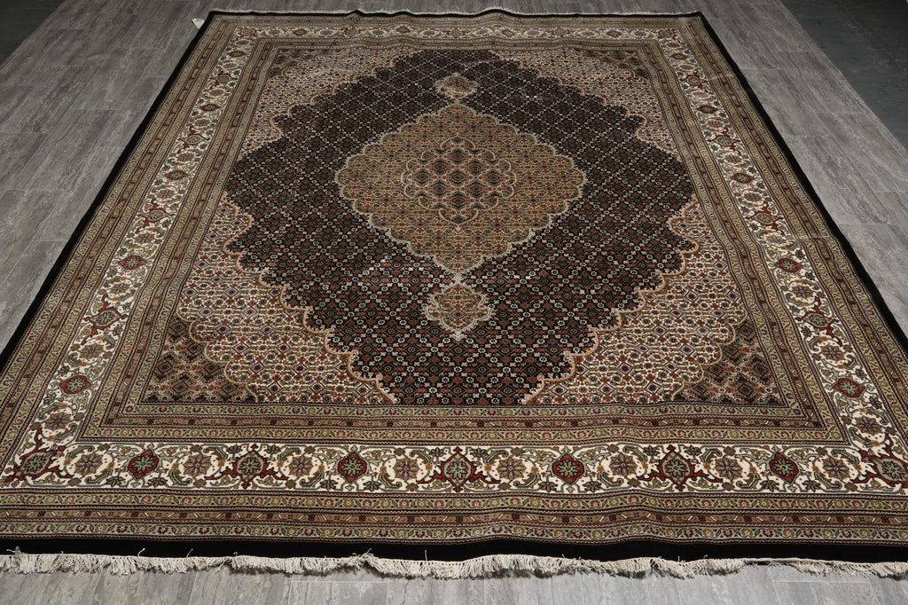 Decorative rug with intricate patterns on a wooden floor