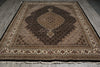 Load image into Gallery viewer, Decorative rug with intricate patterns on a wooden floor