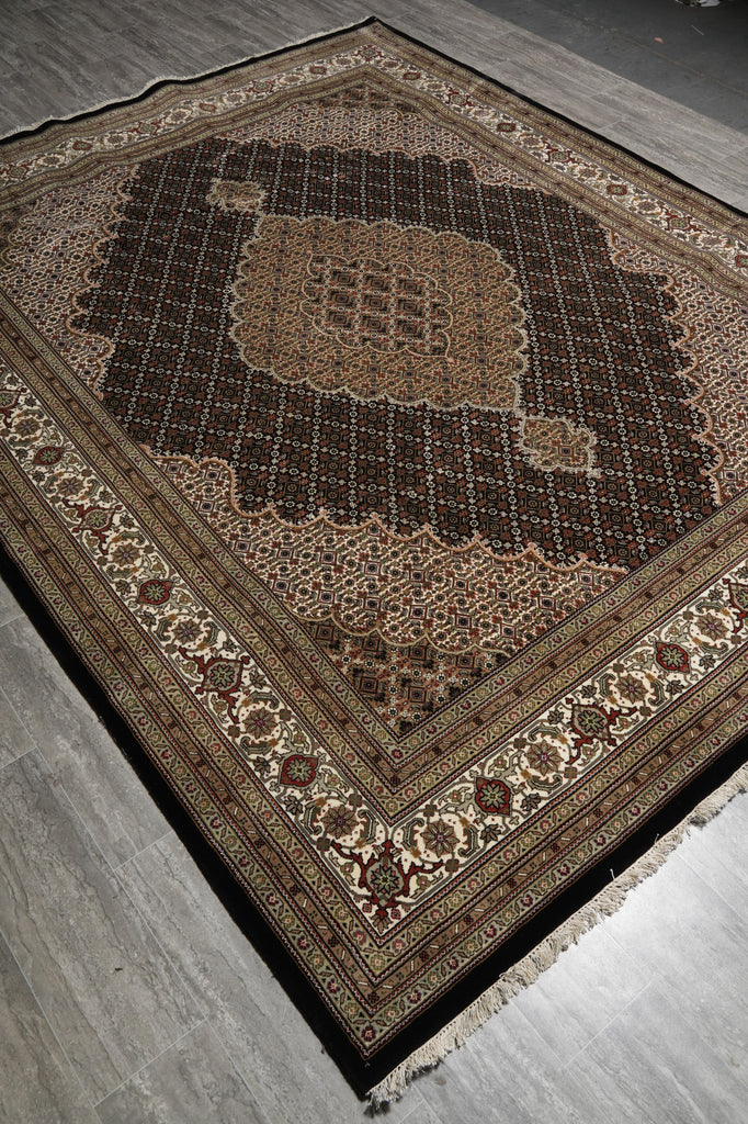 Decorative rug with intricate patterns on a wooden floor