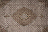 Load image into Gallery viewer, Close-up of a patterned rug with intricate designs.