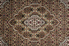 Load image into Gallery viewer, Close-up of a patterned rug with intricate designs.