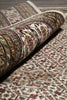 Load image into Gallery viewer, Close-up of a patterned rug with intricate designs.