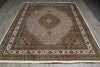 Load image into Gallery viewer, Decorative rug with intricate patterns on a wooden floor