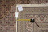 Load image into Gallery viewer, Patterned rug with a measuring tape and ladle on top, against a similar rug background.