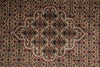Load image into Gallery viewer, Close-up of a patterned rug with intricate designs.