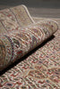 Load image into Gallery viewer, Roll of patterned carpet with intricate designs on a neutral background