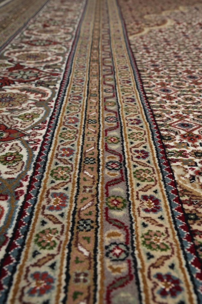 Close-up of a patterned rug with intricate designs.