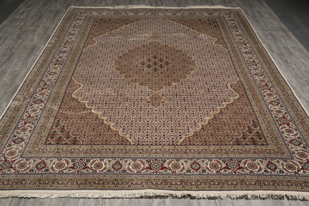 Decorative rug with intricate patterns on a wooden floor