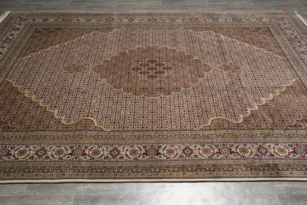 Decorative rug with intricate patterns on a wooden floor