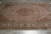 Load image into Gallery viewer, Decorative rug with intricate patterns on a wooden floor