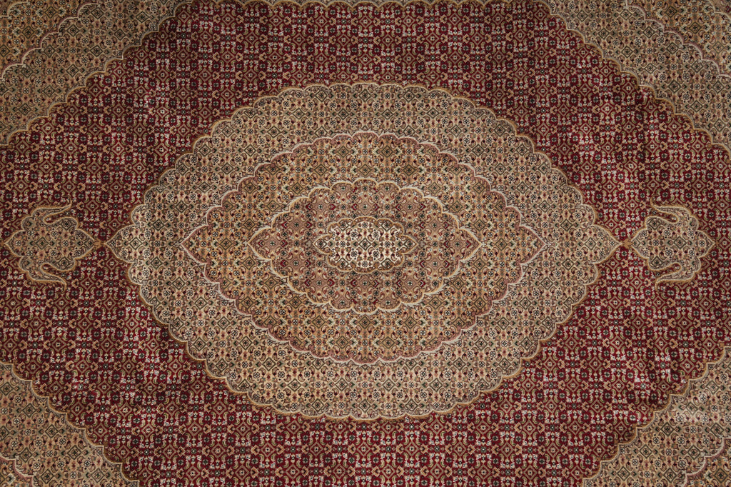 Close-up of a patterned rug with intricate designs.