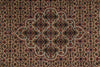 Load image into Gallery viewer, Close-up of a patterned rug with intricate designs.