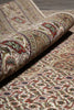Load image into Gallery viewer, Close-up of a patterned rug with intricate designs.