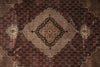 Load image into Gallery viewer, Close-up of a patterned rug with intricate designs.