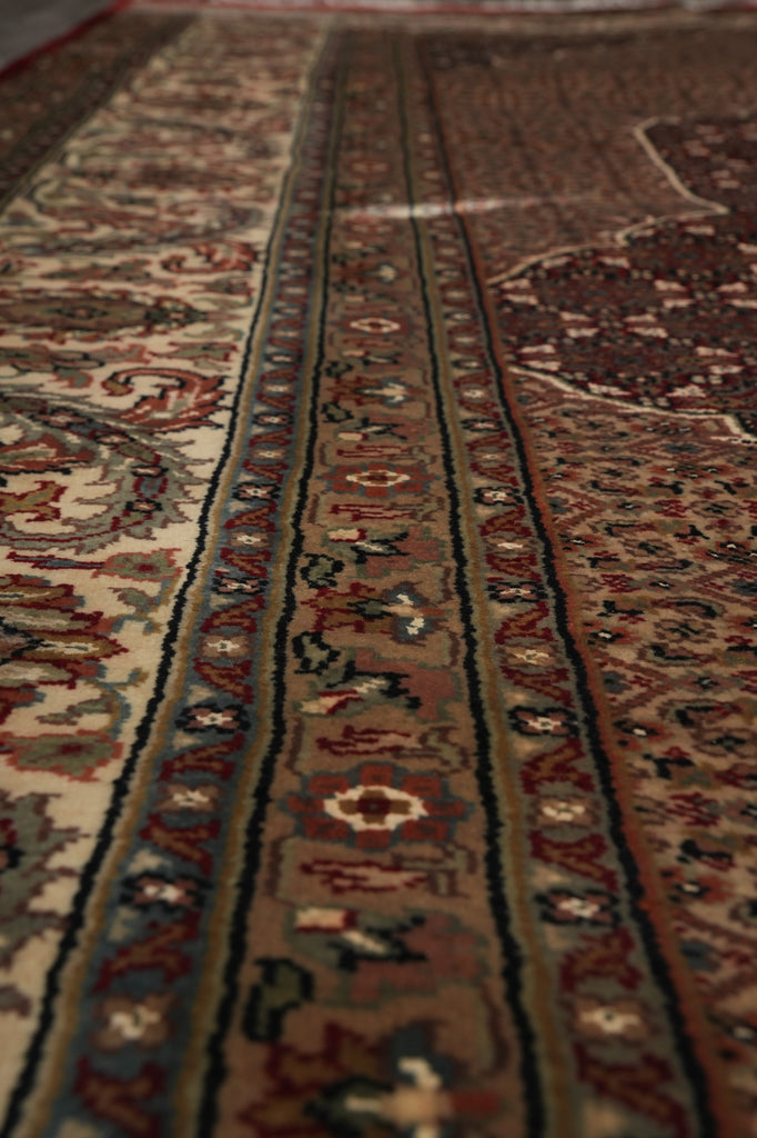Close-up of a patterned rug with intricate designs.