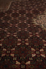 Load image into Gallery viewer, Close-up of a patterned rug with intricate designs.