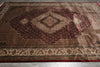Load image into Gallery viewer, Decorative rug with intricate patterns on a wooden floor