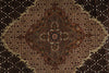 Load image into Gallery viewer, Close-up of a patterned rug with intricate designs.