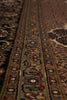Load image into Gallery viewer, Close-up of a patterned rug with intricate designs.