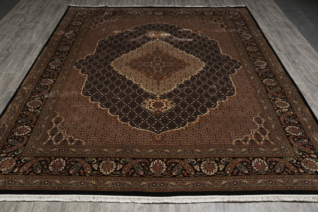 Brown patterned rug on a wooden floor