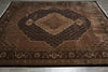 Load image into Gallery viewer, Decorative brown rug with intricate patterns on a wooden floor.