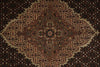 Load image into Gallery viewer, Close-up of a patterned rug with intricate designs.