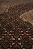 Load image into Gallery viewer, Close-up of a patterned rug with intricate designs.