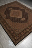 Load image into Gallery viewer, Decorative brown rug with intricate patterns on a gray floor.