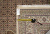Load image into Gallery viewer, Patterned rug with a measuring tape on top, showing dimensions.