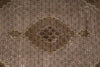 Load image into Gallery viewer, Close-up of a patterned rug with intricate designs