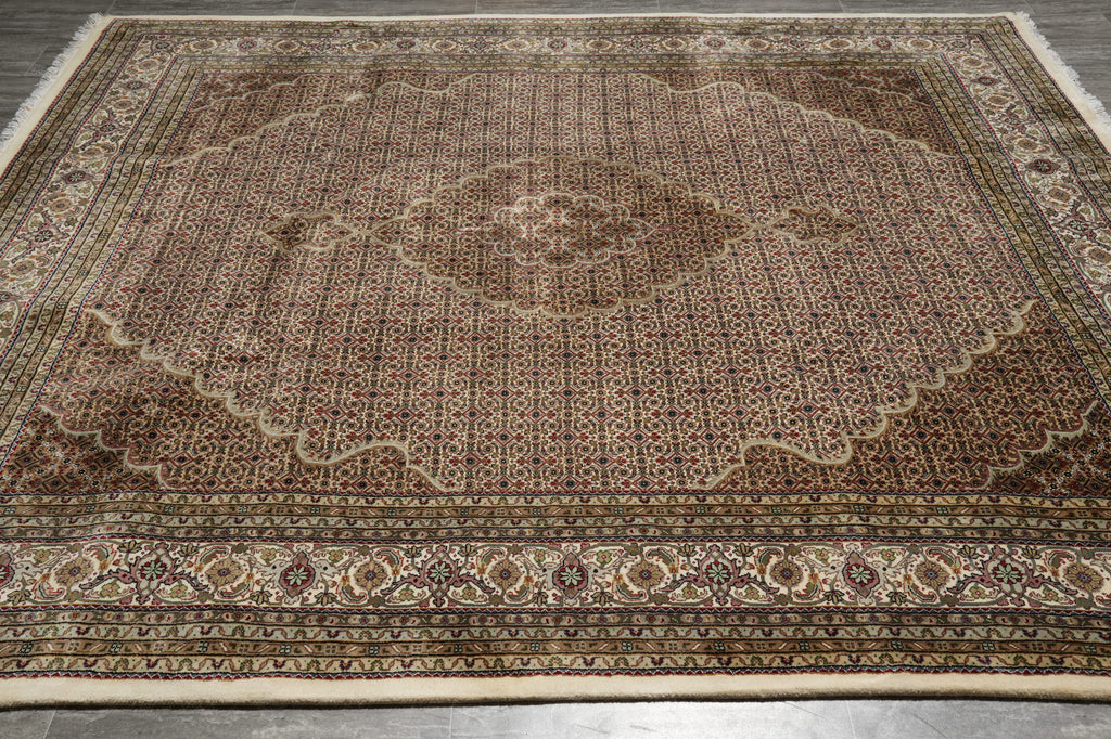 Decorative rug with intricate patterns on a plain background