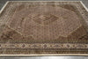 Load image into Gallery viewer, Decorative rug with intricate patterns on a plain background