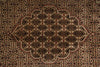 Load image into Gallery viewer, Close-up of a patterned rug with intricate designs.