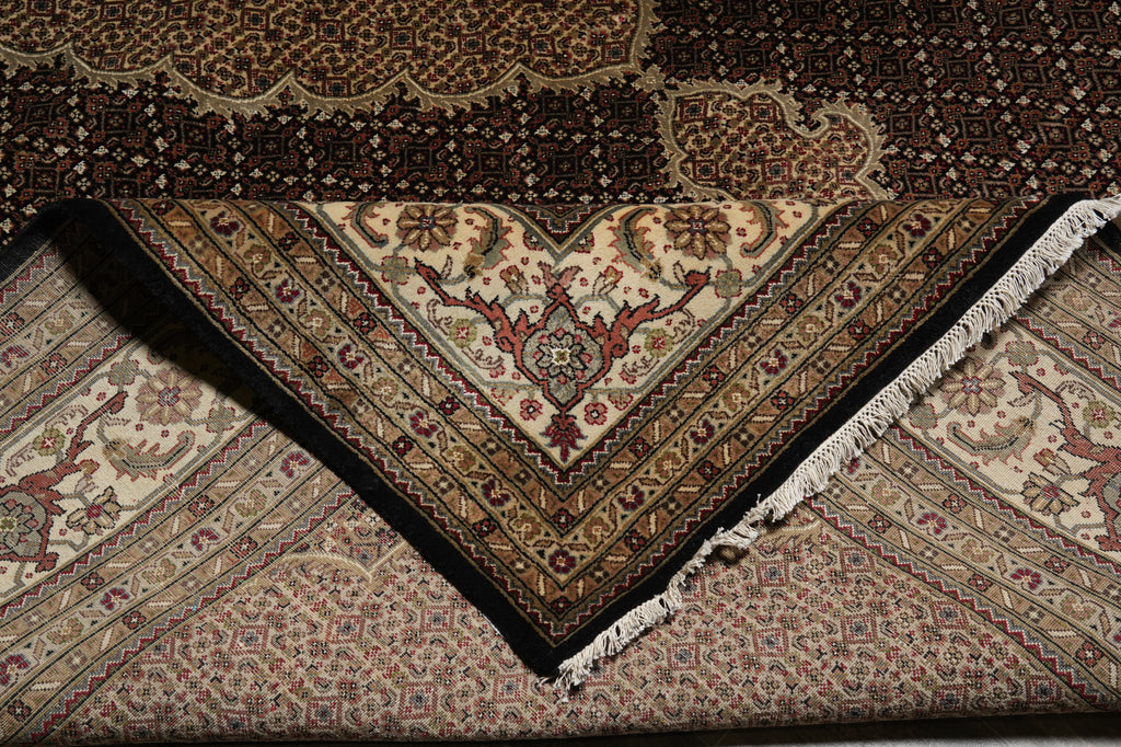 Close-up of a patterned rug with intricate designs