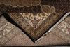 Load image into Gallery viewer, Close-up of a patterned rug with intricate designs