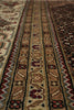 Load image into Gallery viewer, Close-up of a patterned rug with intricate designs.