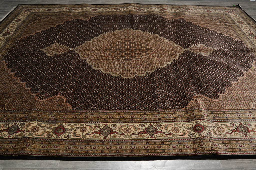 Decorative rug with intricate patterns on a wooden floor