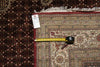 Load image into Gallery viewer, Decorative rug with a measuring tape and size tag.
