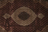 Load image into Gallery viewer, Close-up of a patterned rug with intricate designs.