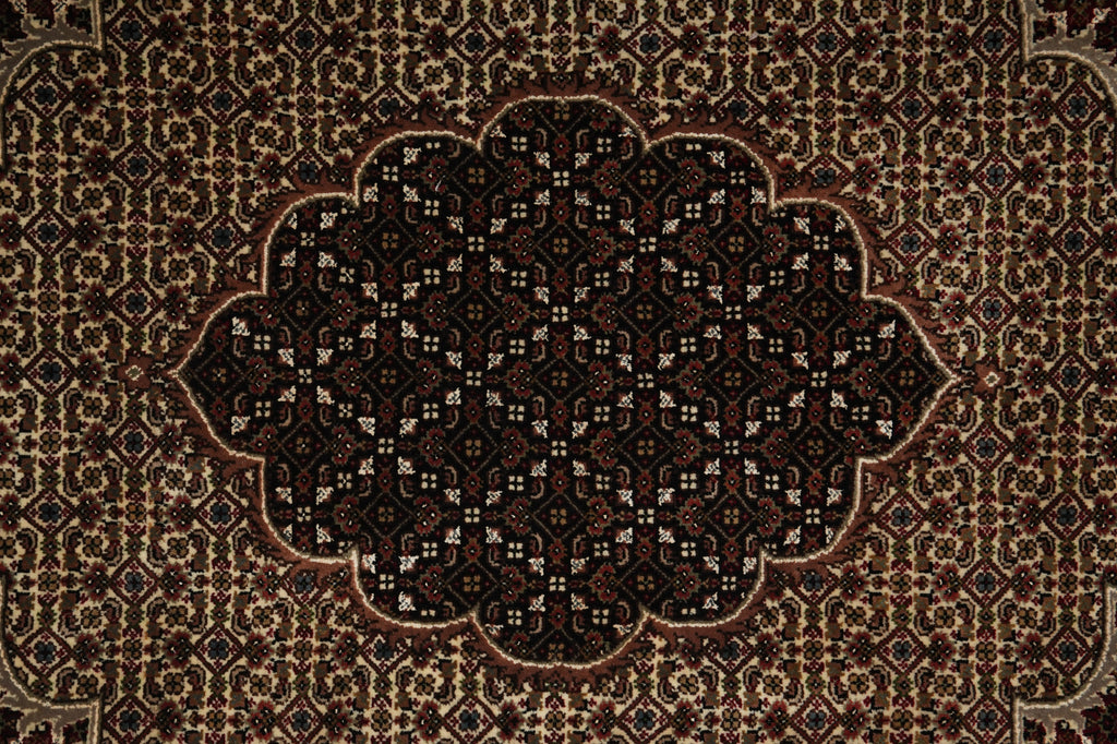 Close-up of a patterned rug with intricate design