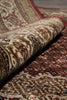 Load image into Gallery viewer, Close-up of a patterned rug with a focus on texture and color.