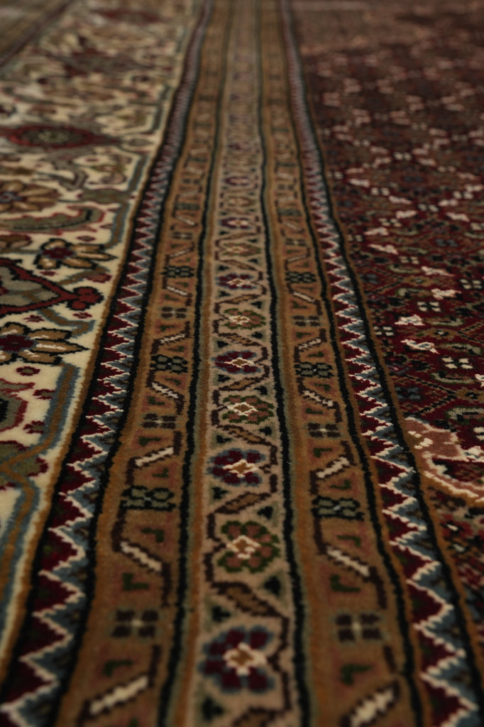Close-up of a patterned rug with intricate designs.