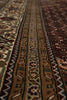 Load image into Gallery viewer, Close-up of a patterned rug with intricate designs.