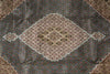 Load image into Gallery viewer, Close-up of a patterned rug with intricate designs.